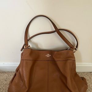 Tan Coach purse.  Excellent condition